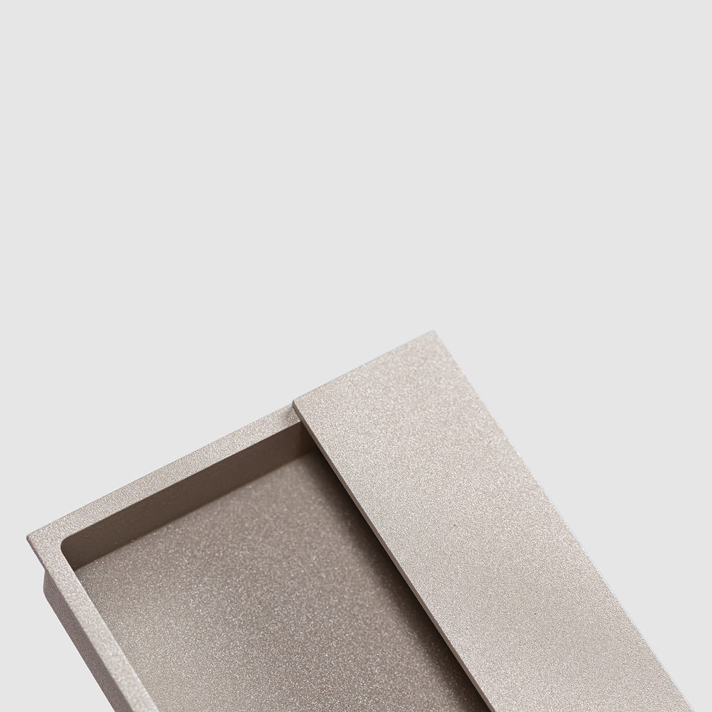 Verum Miles rectangular flush pull in moon grey finish. Architectural door hardware for barn doors, pocket doors, closet doors with magnetic latches. Made in Italy by Verum.