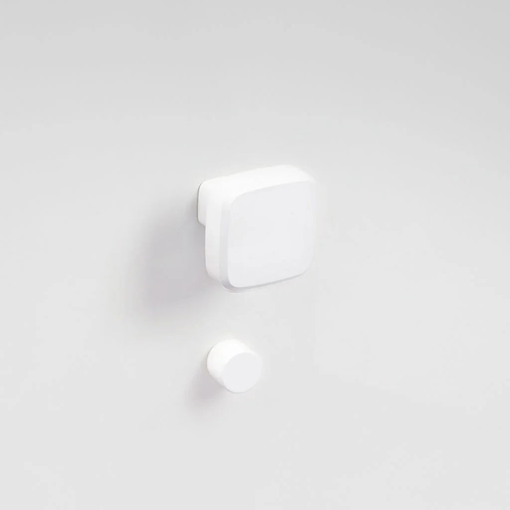 Contemporary Italian square white door knob for interior doors with privacy locking - Product name: Verum Cham with Punto thumb turn. Made by VERUM ITALY.